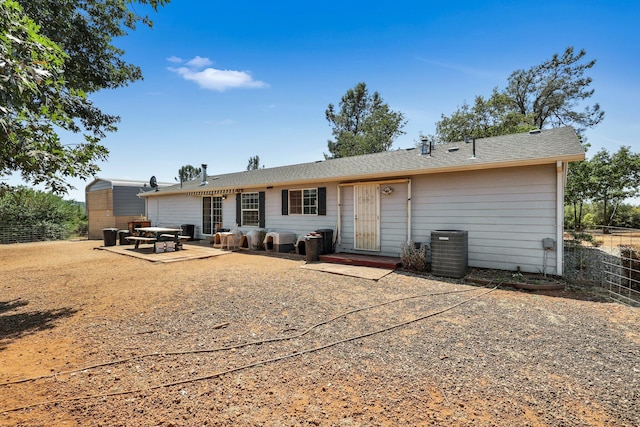 back of property featuring a patio area and central AC unit