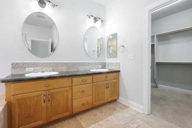 bathroom featuring vanity