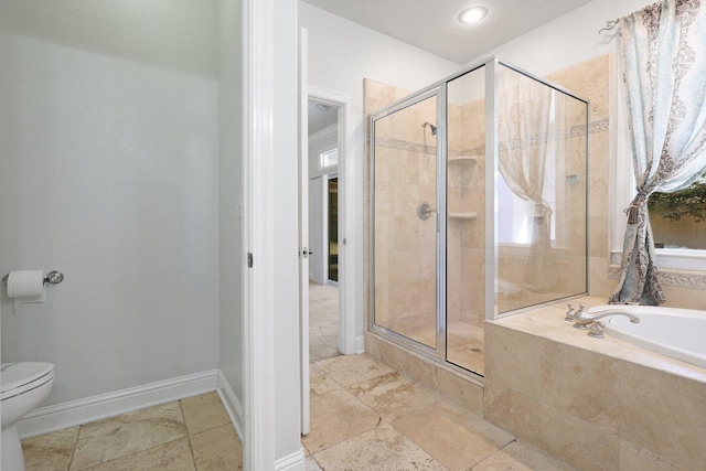 bathroom with shower with separate bathtub and toilet