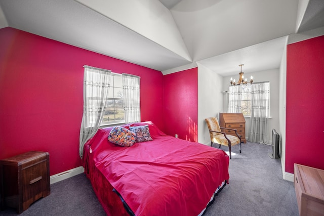 carpeted bedroom with lofted ceiling and an inviting chandelier