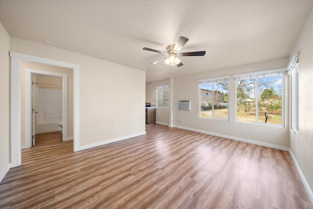 interior space with hardwood / wood-style flooring and ceiling fan