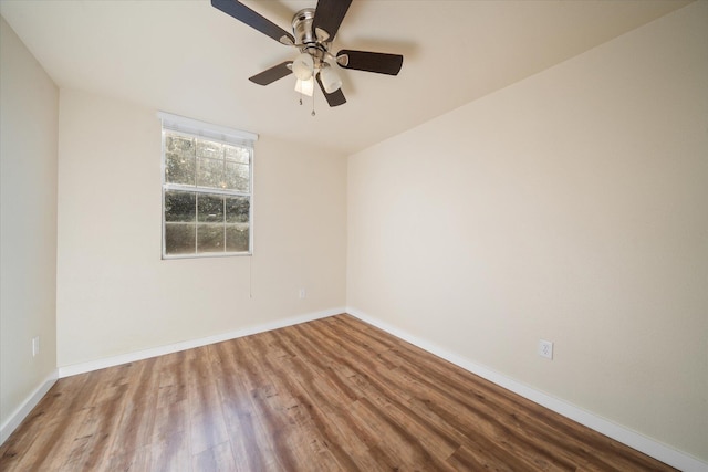 spare room featuring ceiling fan and light hardwood / wood-style floors