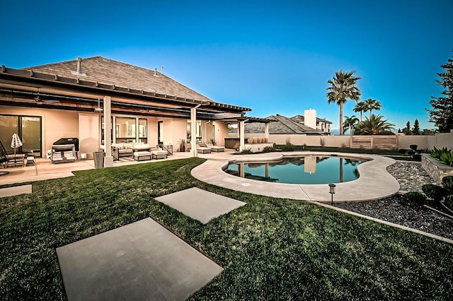 view of pool featuring a patio area, a lawn, and outdoor lounge area