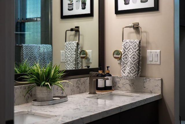 interior space with light stone counters and sink