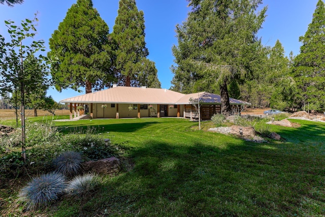 exterior space featuring a front yard