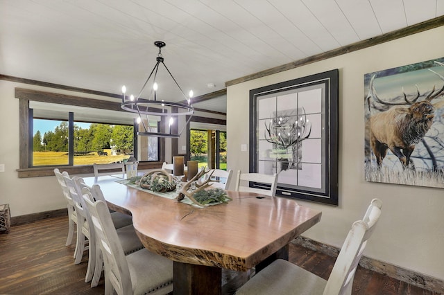 dining space with an inviting chandelier, ornamental molding, dark hardwood / wood-style floors, and wooden ceiling