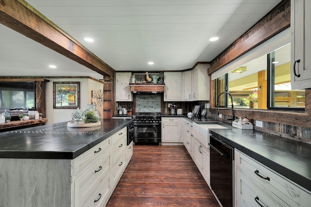 kitchen featuring sink, range with gas cooktop, dark hardwood / wood-style floors, dishwasher, and decorative backsplash