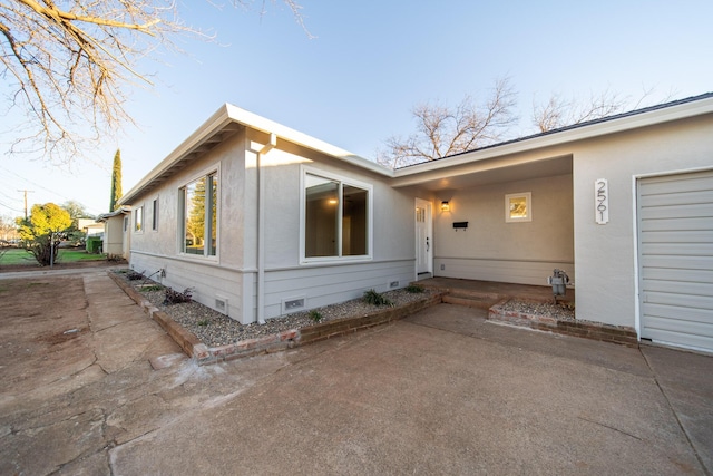 exterior space featuring a garage