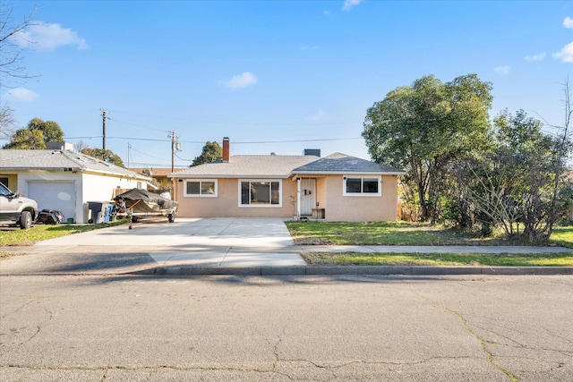 single story home featuring a garage