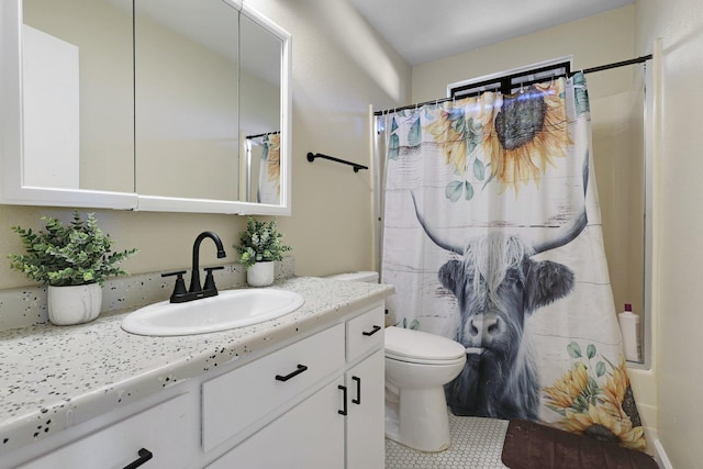 full bathroom with vanity, shower / bathtub combination with curtain, tile patterned floors, and toilet