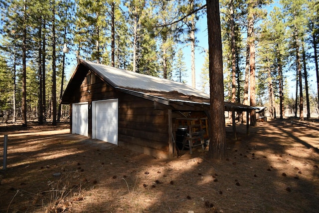 exterior space featuring a garage