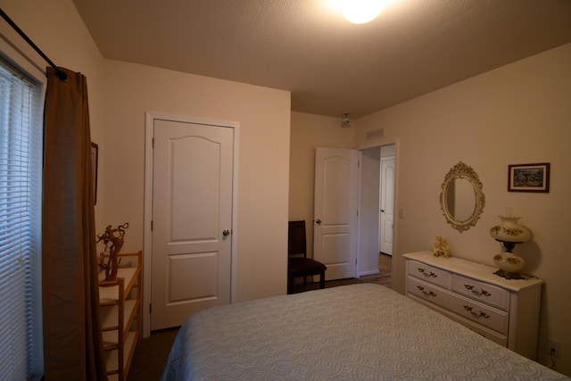 bedroom featuring a textured ceiling