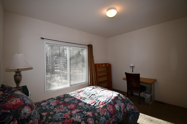 bedroom featuring carpet