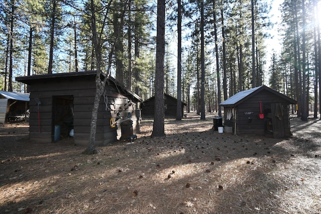 exterior space featuring an outbuilding