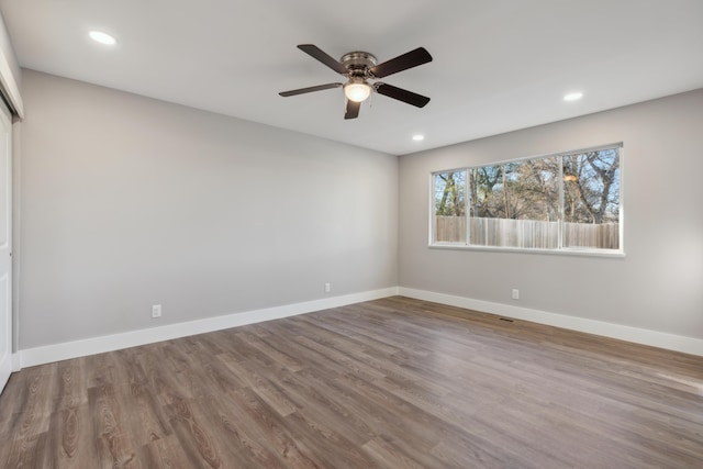 interior space with hardwood / wood-style flooring and ceiling fan