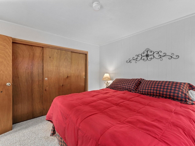 carpeted bedroom with a closet