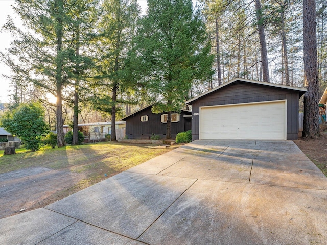 single story home with a garage