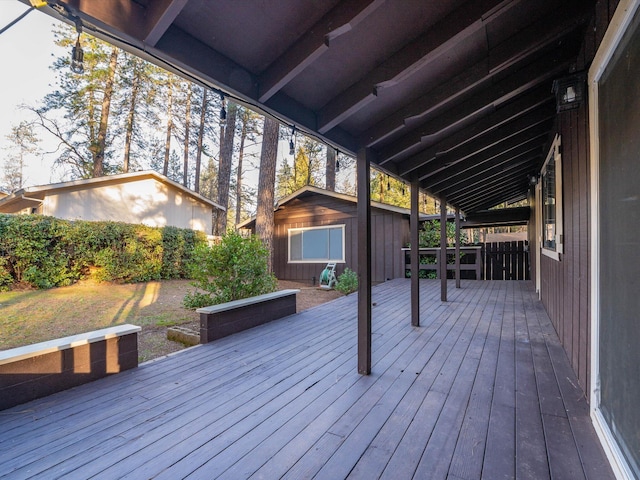 deck featuring a storage shed