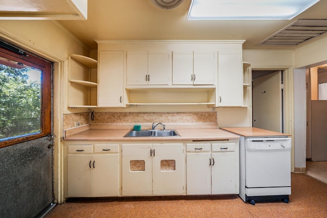 kitchen featuring white cabinetry, white dishwasher, and sink