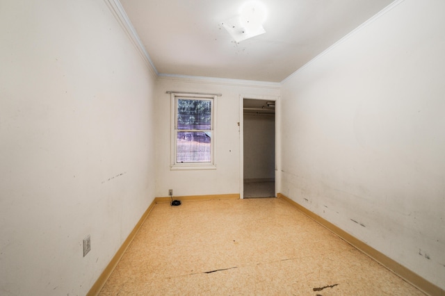 unfurnished bedroom featuring crown molding