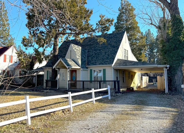 view of front of property with a carport