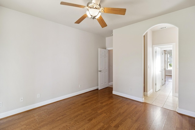 unfurnished bedroom featuring light hardwood / wood-style floors and ceiling fan