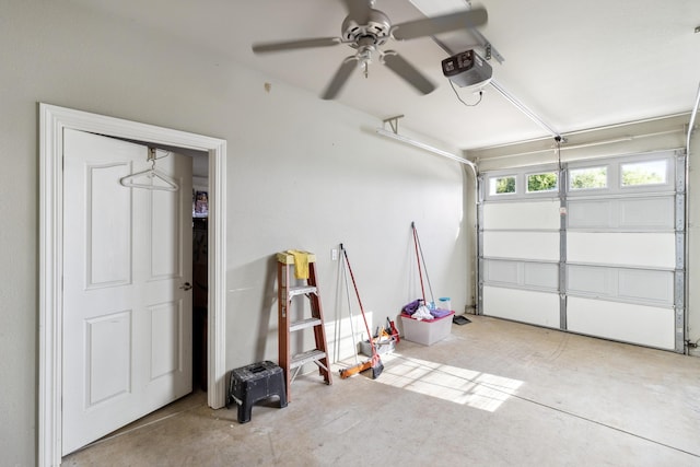 garage with a garage door opener and ceiling fan