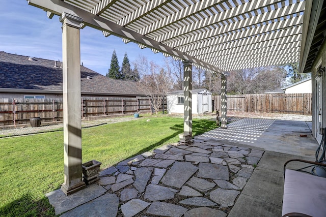 view of patio with a storage shed and a pergola