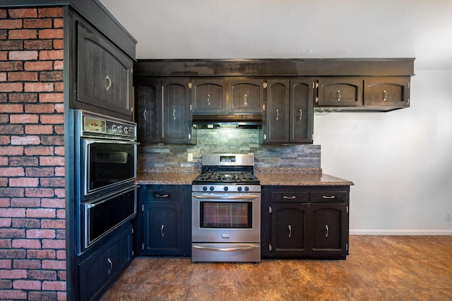 kitchen featuring tasteful backsplash, gas range, dark brown cabinets, and stone countertops