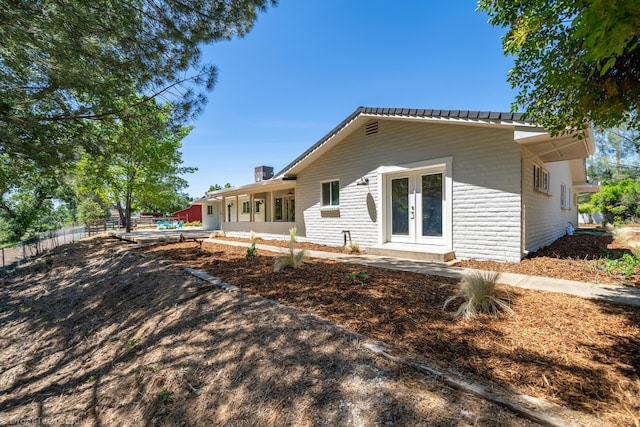 exterior space featuring french doors