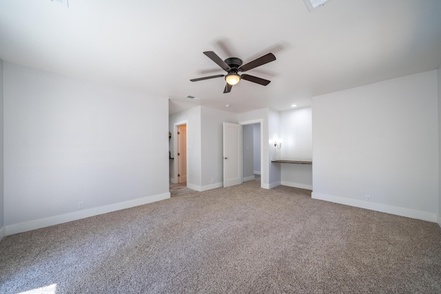 unfurnished bedroom with ceiling fan and carpet flooring