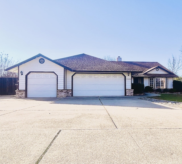 ranch-style home with a garage