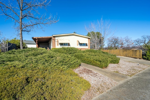 view of front of property with a carport