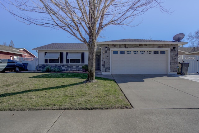 single story home featuring a garage and a front lawn