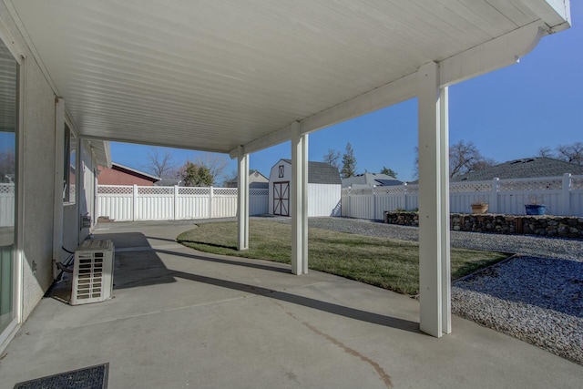 view of patio / terrace with a storage unit