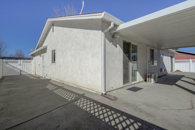 view of home's exterior featuring a patio area