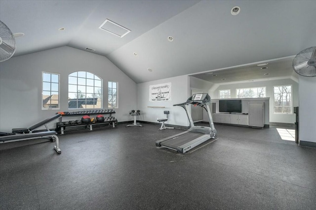 exercise room with lofted ceiling