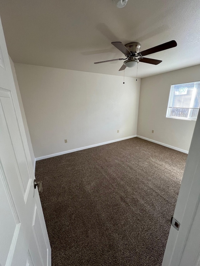 empty room with carpet flooring