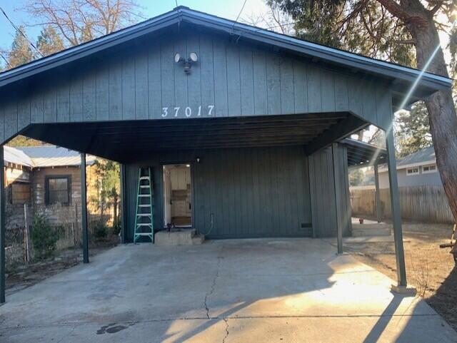 view of front of property with a carport