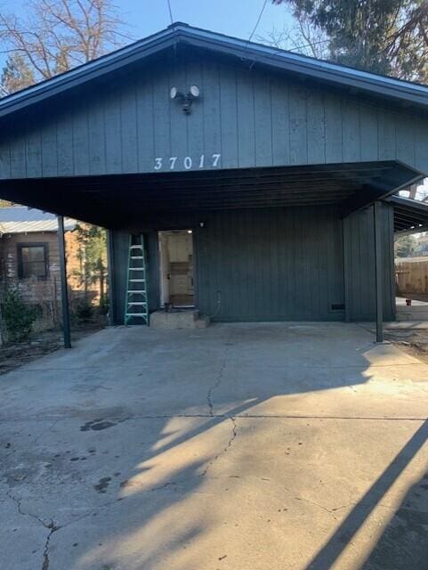 view of front of home with a carport