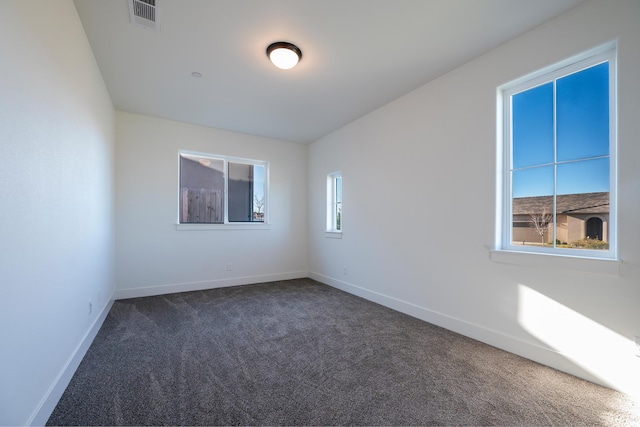 view of carpeted spare room