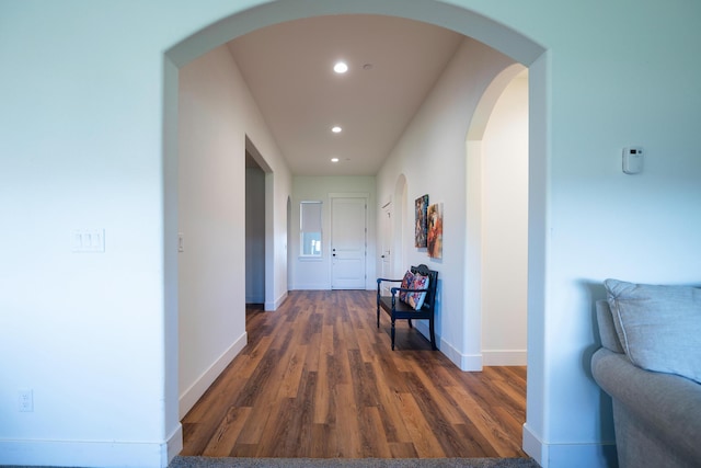 corridor featuring dark hardwood / wood-style flooring