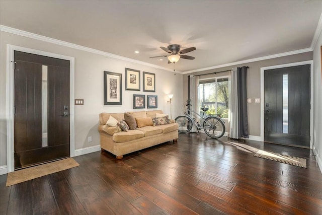 living room with crown molding, ceiling fan, and dark hardwood / wood-style flooring