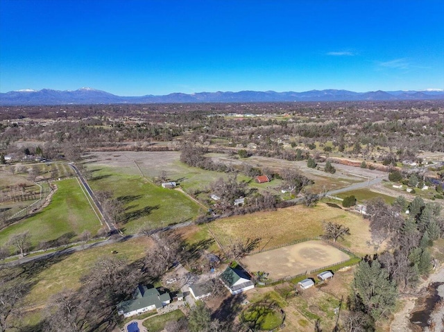 drone / aerial view featuring a mountain view