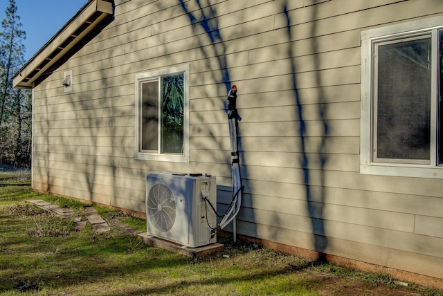 view of property exterior featuring ac unit