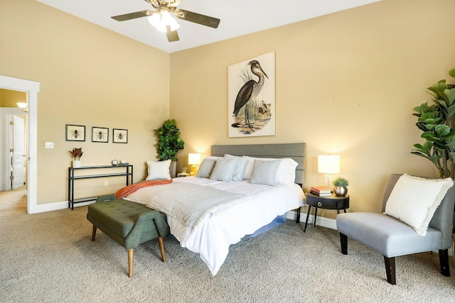 bedroom with ceiling fan and light colored carpet