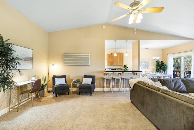 carpeted living room with ceiling fan with notable chandelier, sink, and vaulted ceiling