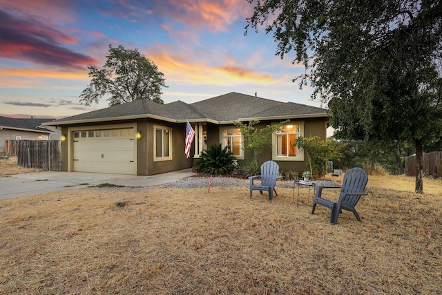 prairie-style house featuring a garage