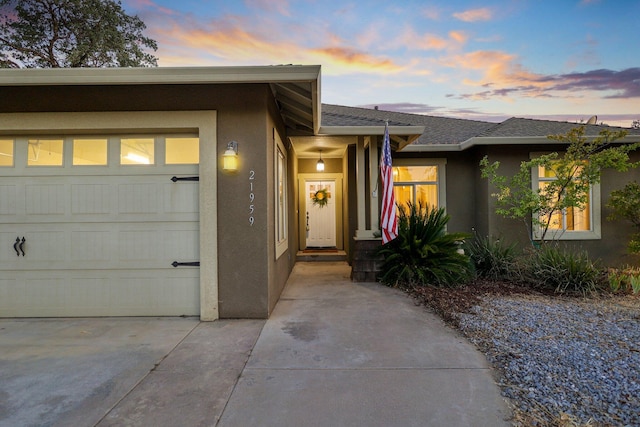 view of front of property featuring a garage