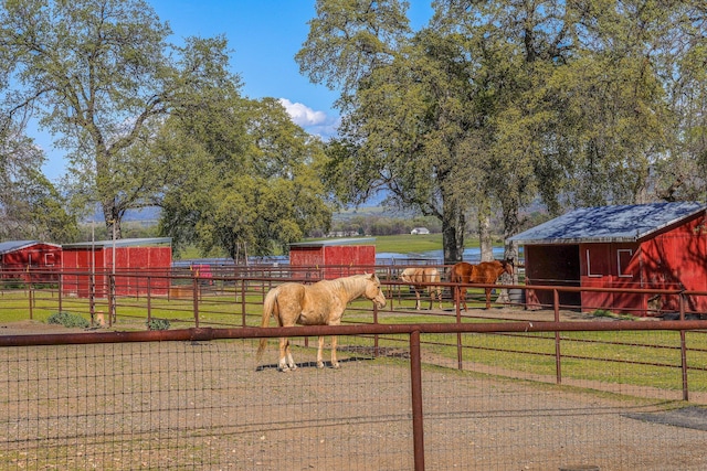 exterior space with a rural view